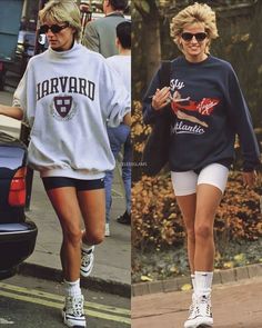 two women walking down the street, one in shorts and the other in sweatshirts