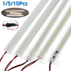 three white leds with red and yellow wires attached to the back of each light