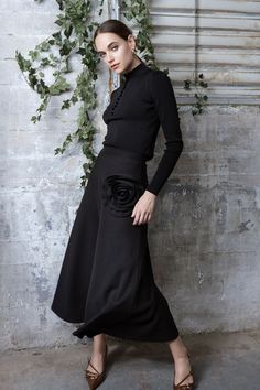 A striking design that exudes both sophistication and artistic charm. The Black Rosetta Skirt features a unique satin rosette embellishment at the waist, adding a touch of feminine flair to its minimalist silhouette. This elegant skirt flows beautifully, making it perfect for both casual and formal events. 
✨ #RosettaSkirt #BlackSkirt #ElegantStyle #MinimalistFashion #FeminineFlair #ChicLook #FashionStatement  #TimelessFashion #FallFashion #AutumnStyle🌹 Chic Full Maxi Skirt, Chic Long Pleated Skirt, Chic Denim Midi Skirt, Elegant Asymmetrical Maxi Skirt For Fall, Chic Midi-length Maxi Skirt For Work, Chic Flared Maxi Skirt For Work, Chic Flowy Maxi Skirt, Chic Workwear Flared Maxi Skirt, Feminine Midi Workwear Dress