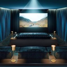 an ad for the london borough of bannet shows a large screen tv in a room with blue curtains