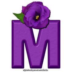 the letter m has a purple flower on it