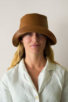 Buttery Soft lambskin leather bucket hat handmade by Alli Marye. This is discounted because it is a sample product with very small imperfections, however, it's of very high-quality material. Made in the USA. Size Medium. Leather Bucket Hat, Gilbert Az, Hat Handmade, Saddle Brown, Leather Bucket, Bucket Hats, Lambskin Leather, Saddle, Caps Hats