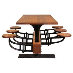 a wooden table with six stools on it and a metal base that is attached to the top