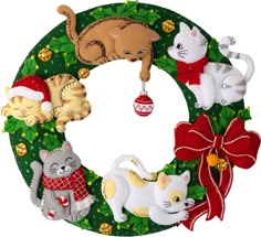 a christmas wreath with cats and kittens on it