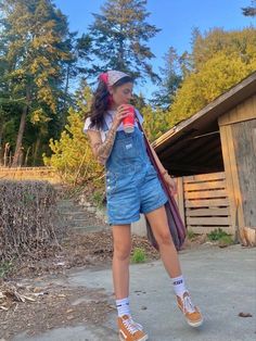 Overall Jean Shorts Outfit, Overalls And Vans Outfit, Bandana And Overalls, How To Style Black Overalls Shorts, Oversized Overalls Shorts, 90s Overall Shorts Outfit, Vintage Overall Shorts, Levi Overalls Shorts, Womens Short Overalls Outfit Ideas