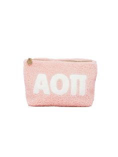 Carry around all your must-haves in style with this Sorority Greek Letter Teddy Pouch! Perfect for throwing into a bag or toting around separately, this cute lil' pouch is made of soft sherpa material and features a gold zipper detail with a retro floral interior lining. Store all your makeup, snacks, and more in the pouch and make sure everyone knows how much your love your sorority! Dimensions: 10.5" x 6.5" x 3" Official Greek Licensed Available Sorority Chapters: Alpha Chi Omega, Alpha Delta Big Little Basket, Omega Alpha, Delta Delta Delta, Big Lil, Alpha Omicron Pi, Kappa Kappa Gamma, Pi Beta Phi, Zeta Tau Alpha, Alpha Delta Pi