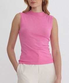 This solid sleeveless top features a high neckline and functional button detail at the shoulders. A chic wardrobe staple to wear alone or to layer under a blazer. The pretty pink shade is a must for summer! 100% nylon Unlined, knit, semi-sheer, lightweight Model is wearing a size small and is 5'10" Trendy Mock Neck Top For Spring Workwear, Trendy Turtleneck Tank Top For Summer, Chic Sleeveless Mock Neck Top For Summer, Trendy Turtleneck Tank Top For Spring, Spring High Neck Fitted Tank Top, Pink Fitted Sleeveless Top, Fitted High Neck Tank Top For Spring, Summer Sleeveless Stretch Mock Neck Top, Chic Sleeveless Mock Neck Top