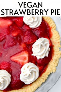 a strawberry pie with whipped cream on top