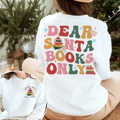 Dear Santa Books Only Sweatshirt, Christmas Reading Shirt, Librarian Christmas Shirt, Books Sweatshirt, Book Lover Gift, Bookworm Shirt Note: For Different Color From Colors List Please "Message us or leave a note" MATERIAL UNISEX T-SHIRT - Medium fabric (5.3 oz/yd² (180 g/m - Classic fit - Runs true to size - 100% cotton (fiber content may vary for different colors) - Tear-away label UNISEX SIZING CHART Small: Length 28" - Width 18" (4-6) Medium: Length 29" - Width 20" (6-10) Large: Length 30" Library Christmas Shirt, Dear Santa Book, Bookworm Shirt, Christmas Reading, Reading Shirts, Sweatshirt Christmas, Christmas T Shirt, Dear Santa, Colour List