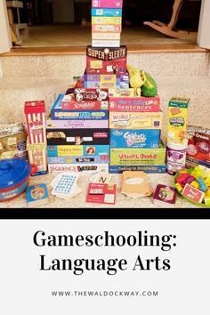 a pile of games and language arts sitting on top of a table