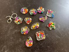 Super fun handmade resin bubble with clear background with keychain hardware.  This listing is for a single keychain. The resin bubble:  1.5" x 1" x .25" deep with colorful gelcaps, capsules, caplets and/or sprinkles. All bubbles will already have keychain hardware or ribbon, you're choice. Our art resin is BPA free and food safe and can be used on coasters, cutting boards, tumblers, and other kitchen items. High quality, non-toxic, art resin with zero VOCs and odor free is always used. All epoxy resin may yellow over time, to avoid this please limit direct sunlight exposure.   Micro air bubble will occur during the mixing of 2-part epoxy resin.  Some micro bubbles may remain after the curing process. Resin Care:   TO CLEAN, USE A SOFT CLEAN TOWEL DO NOT SOAK NOT MICROWAVE SAFE NOT DISHWAS Toxic Art, Resin Bubble, Chill Pill, Clean Towels, Crochet Owl, Clear Background, Art Resin, Pocket Knives, Kitchen Items