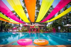 an inflatable pool float sitting on the side of a swimming pool