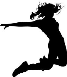 a woman jumping in the air with her arms outstretched