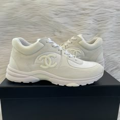 Chanel Interlocking Cc Logo Sneakers Tennis Shoes Size 40.5 In White Brand New In Box, Never Worn, No Flaws! Note: Chanel Sneakers Tend To Run Small. Chanel Interlocking Cc Logo Shoes, Luxury High-top Sneakers With Round Toe For Sports, Luxury High-top Sports Sneakers, Luxury High-top Custom Sneakers With Cushioned Footbed, Luxury Custom High-top Sneakers With Cushioned Footbed, Luxury Sports Sneakers With Round Toe, Luxury Custom Sneakers For Sports With Round Toe, Luxury High-top Sneakers With Medium Fit, Luxury High-top Sneakers Medium Fit