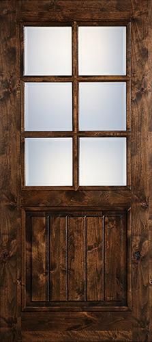 a wooden door with glass panes on it