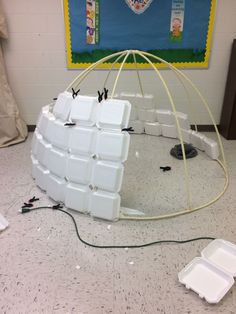 a large white object sitting on top of a floor