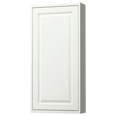 a white kitchen cabinet with no doors on the front and side panel, in an unfinished finish