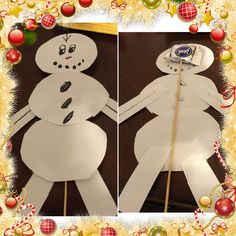 two paper snowmen holding hands in front of christmas decorations