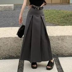 Features: Stylish and trendy long skirt, exuding a fashion-forward look 👚🌟 Made with high-quality fabric for ultimate comfort and breathability 😍🌸 Beautiful gray color, adding a touch of elegance to any outfit 🌈👌 Flattering and flowy silhouette, perfect for any body type 💃🌟 Designed with Korean fashion sensibilities, paying attention to intricate details 🎀🌼 Versatile Styling Options: Ideal for both casual outings and formal occasions 🎉🌸 Pair it with a chic blouse or crop top for a so Cute Long Skirt Outfits, Korean Long Skirt, Gray Long Skirt, Korean Skirts, Long Skirt And Top, Gothic Punk Fashion, Skirt Korean, Long Skirt Outfits, Harajuku Outfits