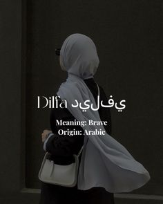 a woman wearing a hijab and carrying a white handbag in arabic writing