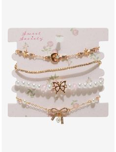 Sweet Society Pearl Bow Butterfly Bracelet Set | Hot Topic Emily The Strange, Faux Pearl Bracelet, Acrylic Set, Blue Beetle, Butterfly Bracelet, Lady And The Tramp, Butterfly Charm, A Christmas Story, Hot Topic