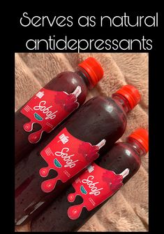 three bottles of fruit juice sitting next to each other on top of a blanket with text overlay that reads serve as natural antidepressants