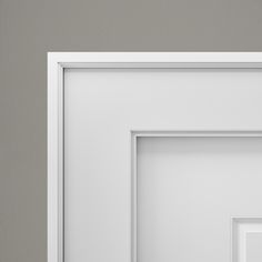 an open white door on a gray wall