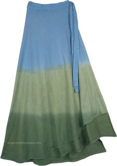 Costa de Sol Wrap Around Beach Skirt - A great skirt for some coolness in the sun; this skirt is an amazing choice to wear to the beach this summer. The skirt`s fabric is dyed in green and blue, the entire fall of the skirt is full with a graceful side wrap. Made of 100% cotton, its long flowy fabric will keep you comfortable, no matter how warm it gets all season long. You can wear this skirt with a plain solid tank top for casual days, and with an embroidered one for an evening party. Pair it Summer Hippie Skirt For Vacation, Hippie Skirt For Summer Vacation, Hippie Summer Vacation Skirt, Summer Vacation Hippie Skirt, Hippie Style Summer Vacation Skirt, Hippie Cotton Wrap Skirt For Beach, Cotton Hippie Wrap Skirt For The Beach, Fitted Summer Wrap Skirt, Green Pleated Skirt For Summer