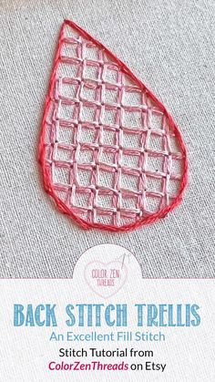 the back stitch trellis is made with red thread