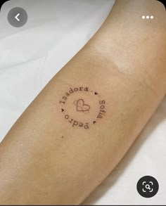 a person with a small tattoo on their arm