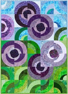 an abstract quilt with purple, green and blue circles