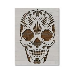 a wooden cutout of a sugar skull