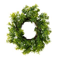 a green wreath with leaves on it