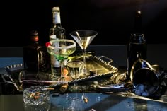 an assortment of alcohol and wine on a table