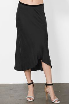 Go Silk Go Luxe Bias Skirt in Black is easy to dress up for an occasion, stylized work skirt and comfortable vacation skirt. The luxe skirt features a bias-cut midi skirt with curve to accentuate in the most flattering of ways. Asymmetrical hem that falls below the knee with a seamed hemline. Slip on with a velvet elastic waistband. 100% silk charmeuse. Vacation Skirt, Vacation Skirts, Bias Skirt, Work Skirt, Clare Vivier, Melissa Joy Manning, Work Skirts, Scarf Top, Silk Charmeuse