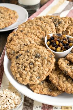 oatmeal cookies and raisins on a white plate