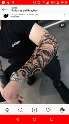 a man with a tattoo on his arm