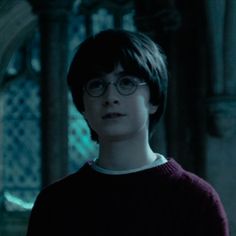 harry potter in glasses looking at the camera