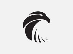 an eagle's head in black and white on a light background, suitable for logos or emblems