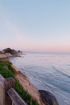 the ocean and beach are next to each other