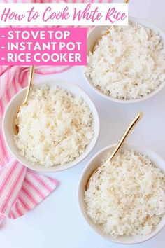 three white bowls filled with rice on top of a pink and white table cloth next to gold spoons