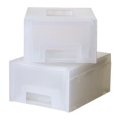 two plastic storage boxes sitting on top of each other