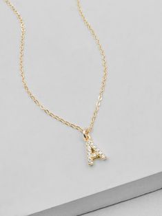 "This initial necklace is a perfect gift for your friend, families or bridal party! It's small and dainty, sparkles a ton and isn't over the top! Vermeil letter on a gold filled chain. Necklace comes with an additional 2\" extender. Letters measure approximately 6mm in height. The Following letters have a bail on the left hand corner and are angled when hanging: H, K, L, M, N, U, V, W, X, Y Please read my shop policies to learn more about the composition and proper care for each item purchased. Rose Gold Initial Necklace, Letter Necklace Gold, Gold Initial Necklace, Good Luck Necklace, Dainty Diamond Necklace, Gold Letter Necklace, Diamond Solitaire Necklace, Initial Necklace Gold, Letter Charm