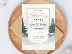 a christmas party flyer on top of a wooden plate next to white snow and pine trees