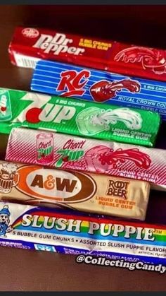 four bars of candy are stacked on top of each other, with different flavors in them