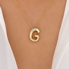 Material: gold plated stainless steel Length: 18" + 2" extension Pendant size: 0.75" x 1" IMPORTED G Bubble Letter, Bubble G, Gold Bubbles, Gold G, Letter Pendant Necklace, Bubble Letters