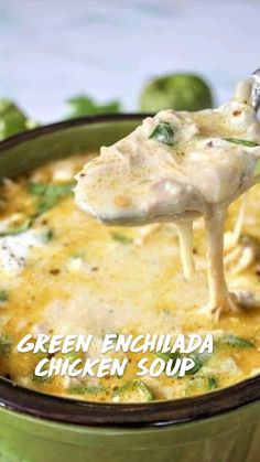 green enchilada chicken soup in a bowl with a ladle scooping out