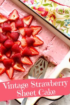 a close up of a cake with strawberries on top and the words vintage strawberry sheet cake