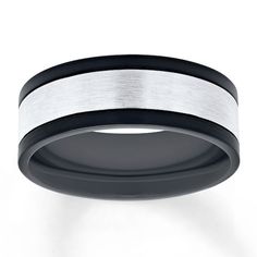 a black and white wedding band is shown