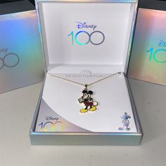 the mickey mouse necklace is in its box and it's ready to be shipped